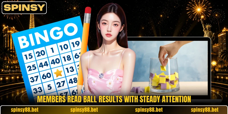 Members read ball results with steady attention Members read ball results with steady attention